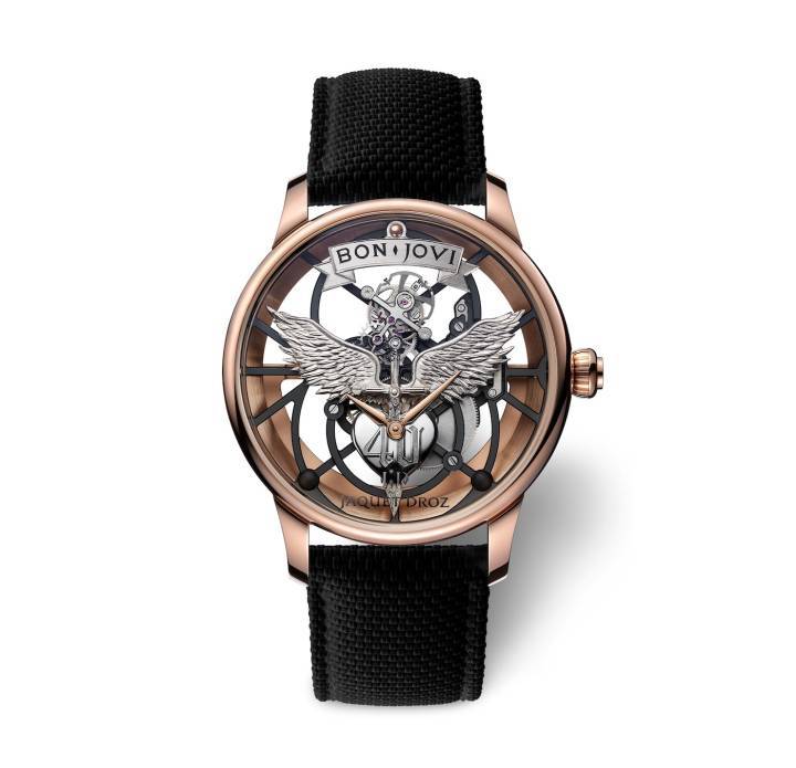 Le Tourbillon Skelet Or Rouge - Bon Jovi est une pièce unique réalisée à la main suivant les spécifications personnelles du chanteur. Tourbillon Squelette Automatique à 8 jours de réserve de marche, elle expose le logo qui célèbre les 40 ans de son groupe, gravé à la main dans un bloc d'or massif.