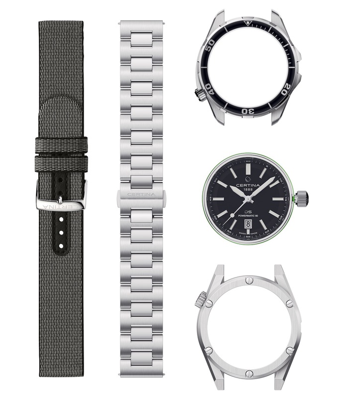  Le kit «Aqua & Sport» se compose d'une tête de montre au cadran noir satiné soleil, d'une carrure à lunette tournante unidirectionnelle noire ainsi que de sa version sportive aux flancs allongés et dotée de six vis. Les deux versions sont accompagnées d'un bracelet textile gris-noir fabriqué en #tide® et d'un bracelet en métal à trois rangs de maillons. 